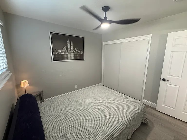 Second bedroom with closet and ceiling fan
